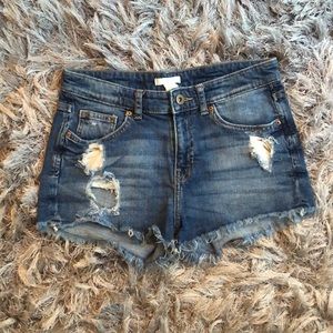 Distressed cut off denim shorts